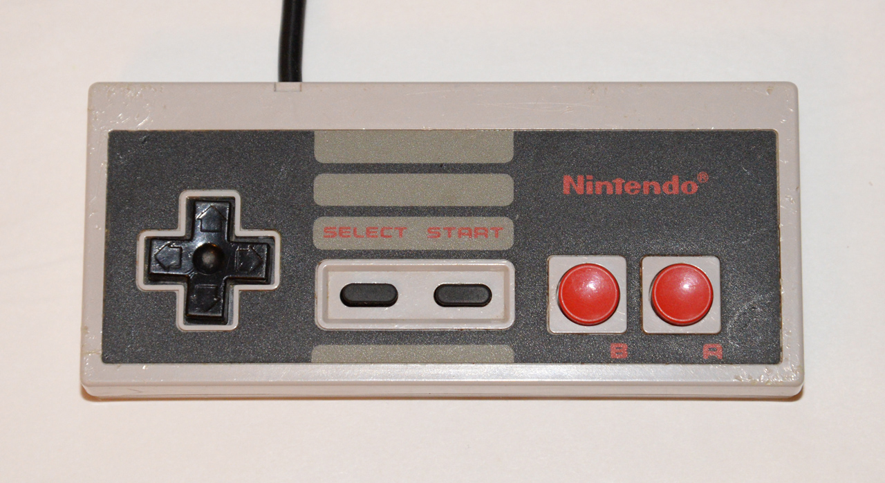 Nintendo control. Контроллер Нинтендо. Nintendo NES Gamepad. NES Joystick. RETROBIT NES Controller Table.